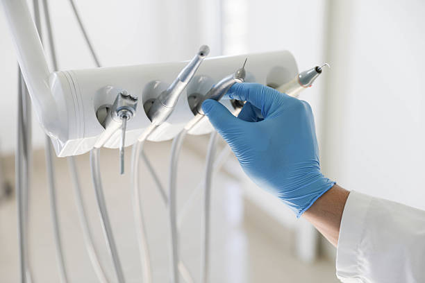 Professional Root Canal Treatment technician working in Milan, TN
